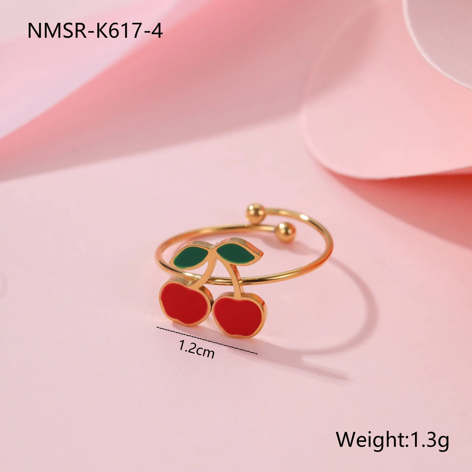 Cherry shaped jewellery set with necklace, bracelet, earrings, and ring in gold-plated stainless steel
