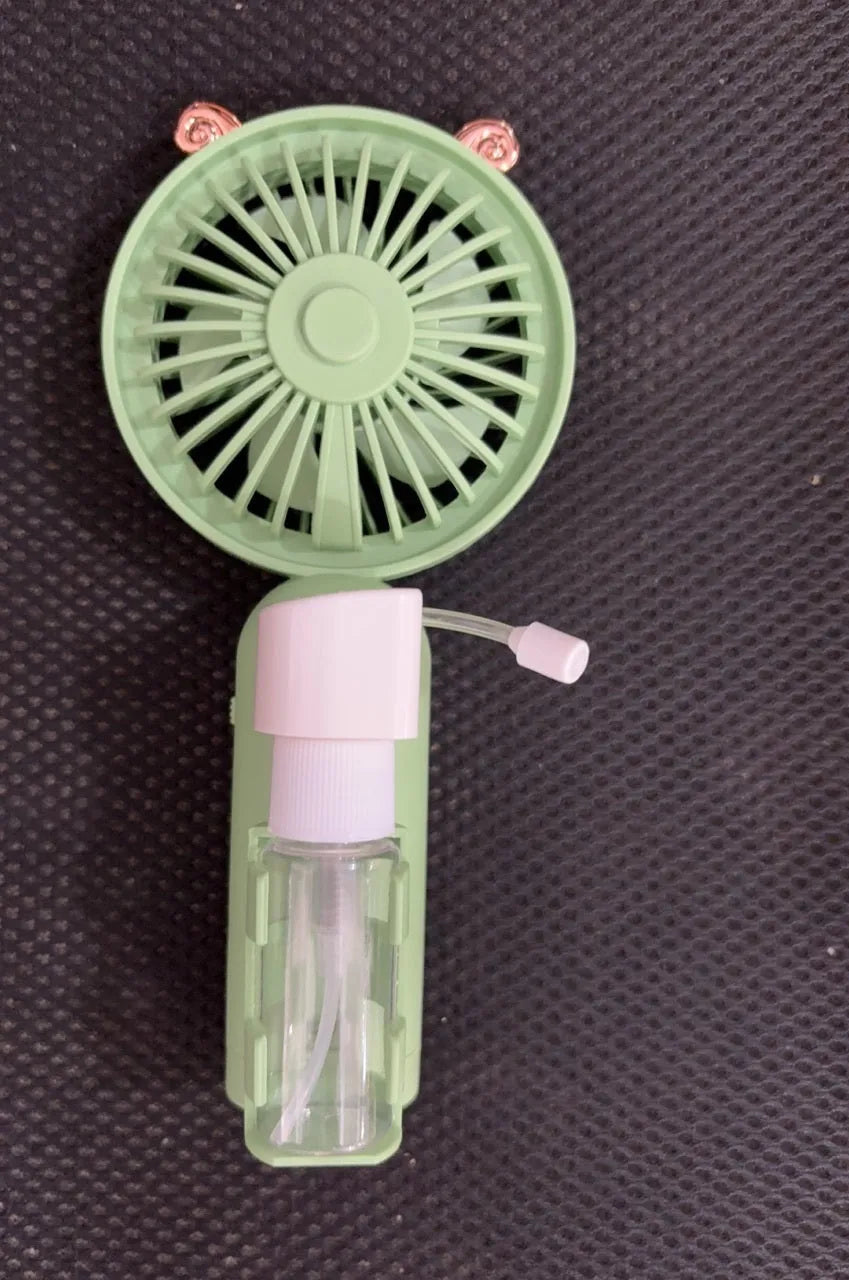 USB rechargeable plastic nozzle desk fan in apricot colour with compact 20cm width design