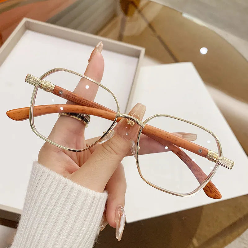 Women's frameless trim glasses with wood grain pattern and gold alloy frame.