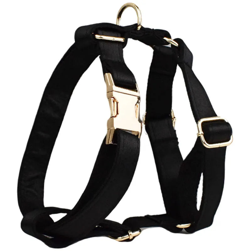 Cloth dog collar and leash set with matching decorative bow and dog vest on a size chart showing S, M, L, XL.