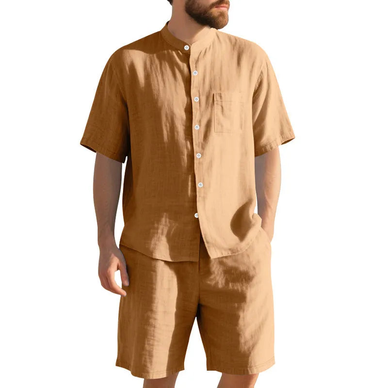 Men's light blue linen blend summer suit with henry collar, short sleeves, and matching shorts