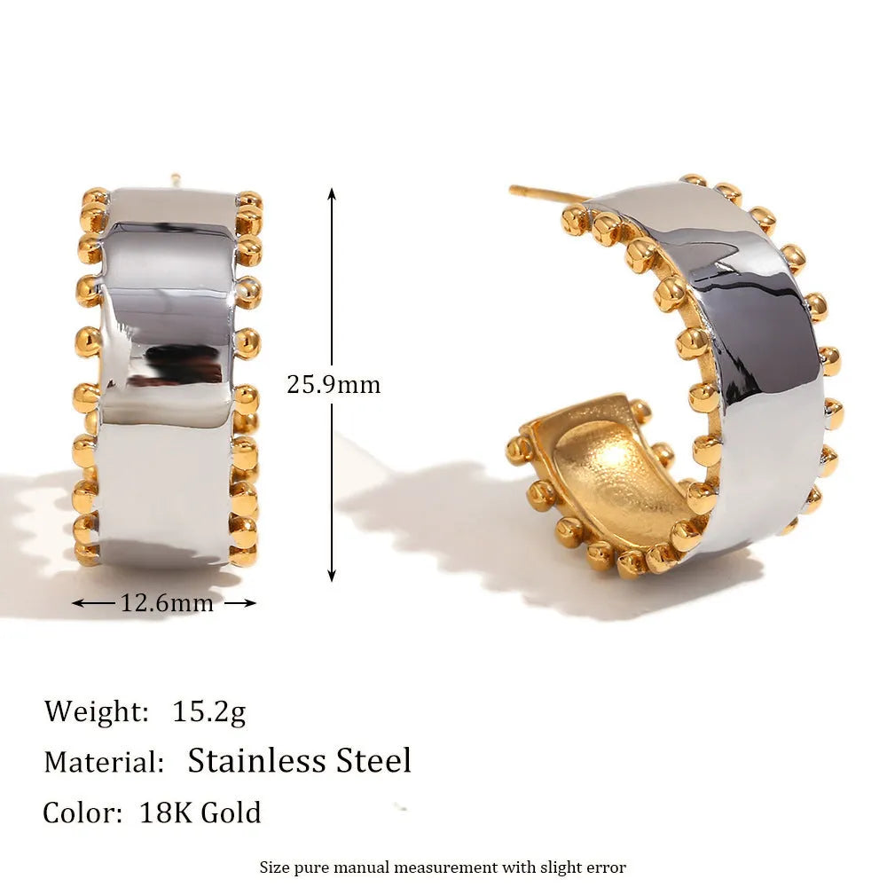 Women's geometric gold stainless steel jewellery set showing earrings, bracelet and necklace