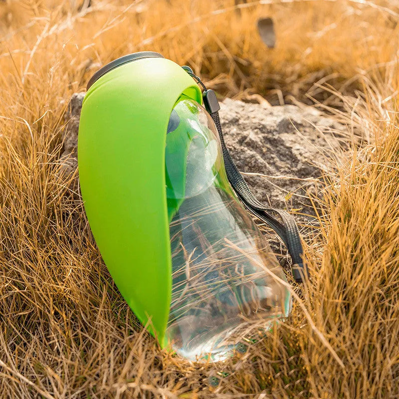 Blue portable pet water bottle with drinking bowl showing water lock mechanism and hanging attachment