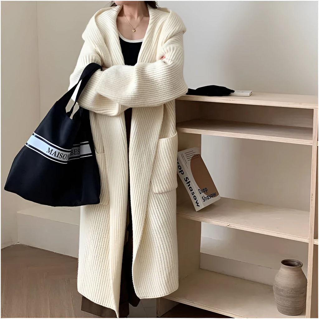 Loose fit women's hooded cardigan coat in soft acrylic fabric, shown in milky white.
