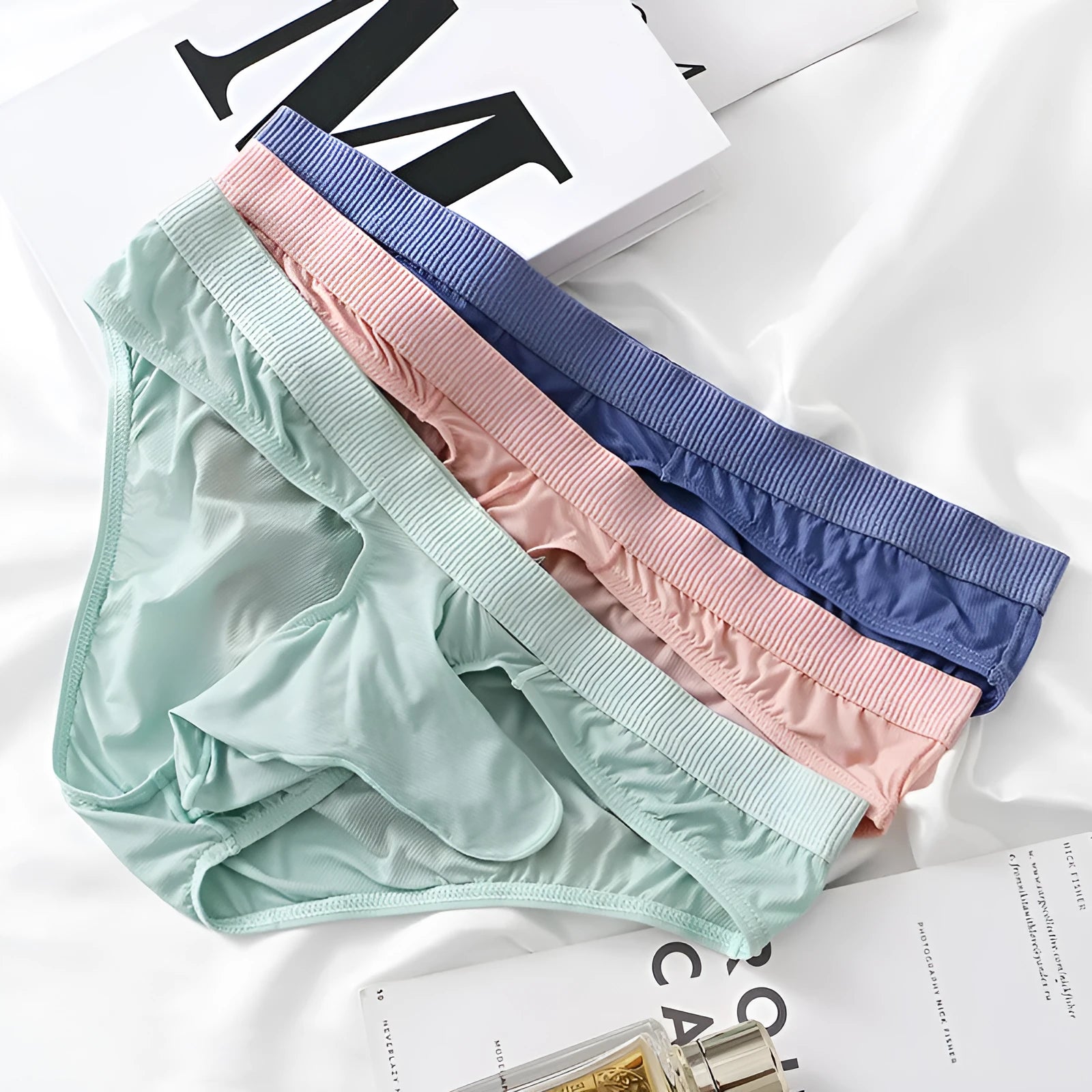 Men's low waist ice silk briefs in multiple colours showing brief styling and fabric detail