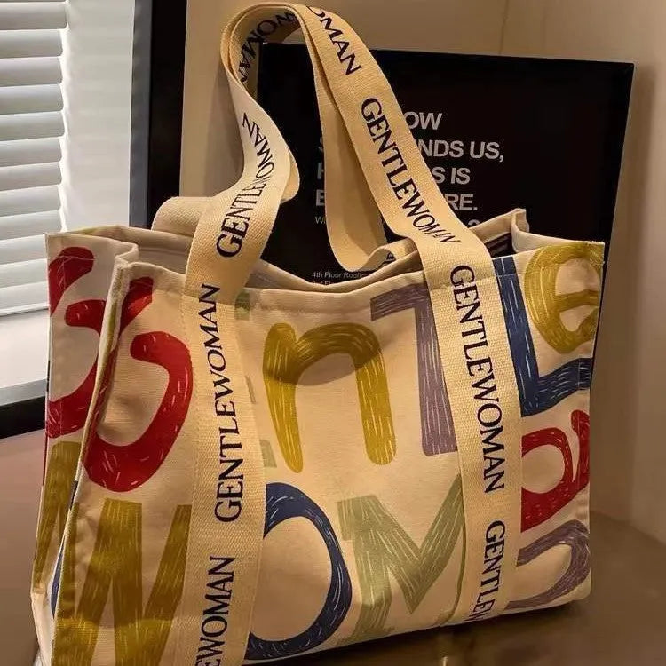 Canvas women's travel tote with printing decoration in large capacity design