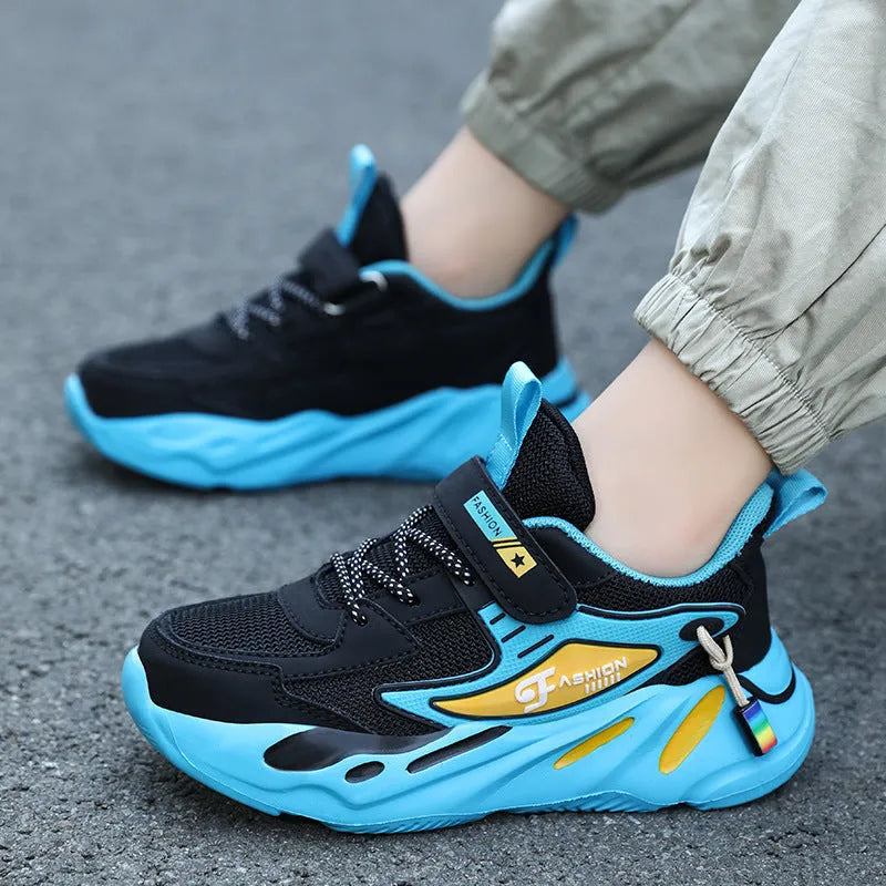 Boys' dark blue and black platform sports running shoes with Velcro strap and mesh upper.