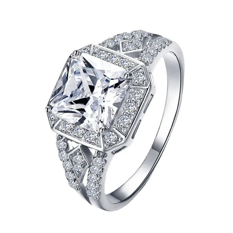 Women's geometric zircon ring with hollow ornamental design and quadrilateral pattern in platinum colour