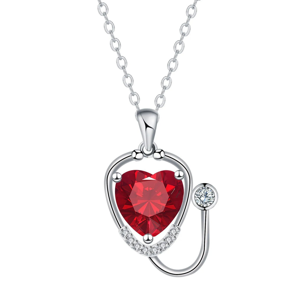 Women's fashion necklace with wings cross stethoscope pendant in red diamond colour
