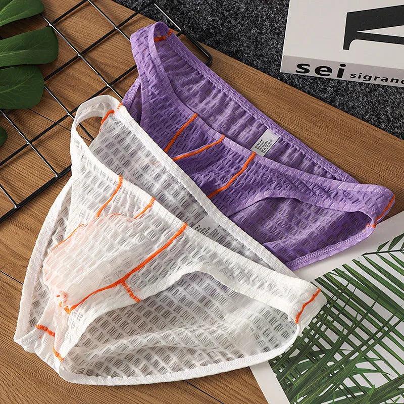 Men's ice silk lace low waist briefs in solid colours on a white background