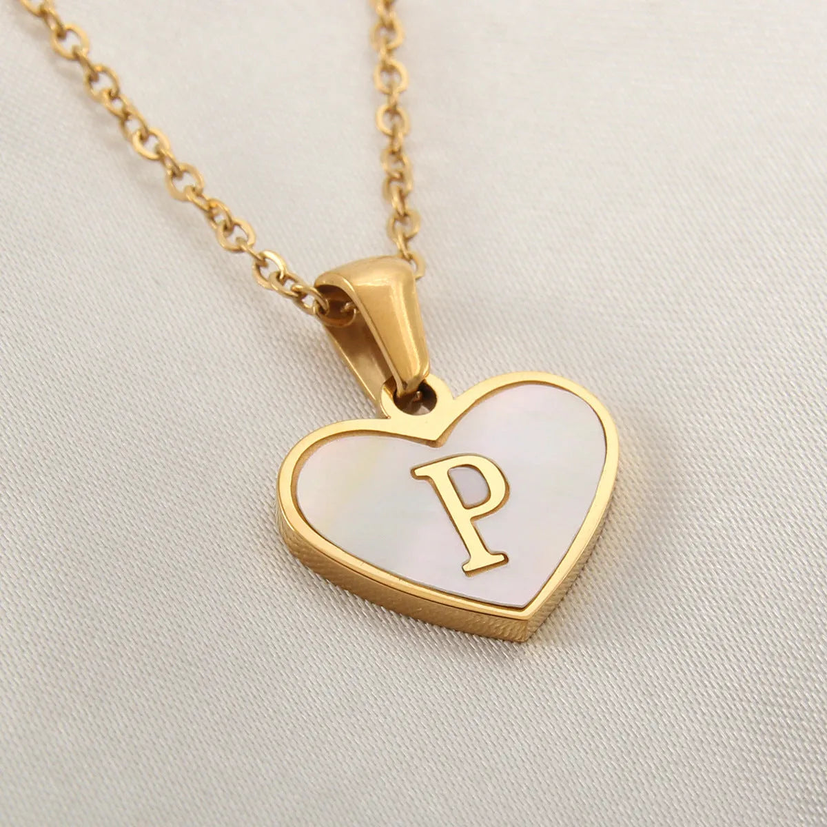 Gold plated personalised heart necklace with white shell on a 45cm chain
