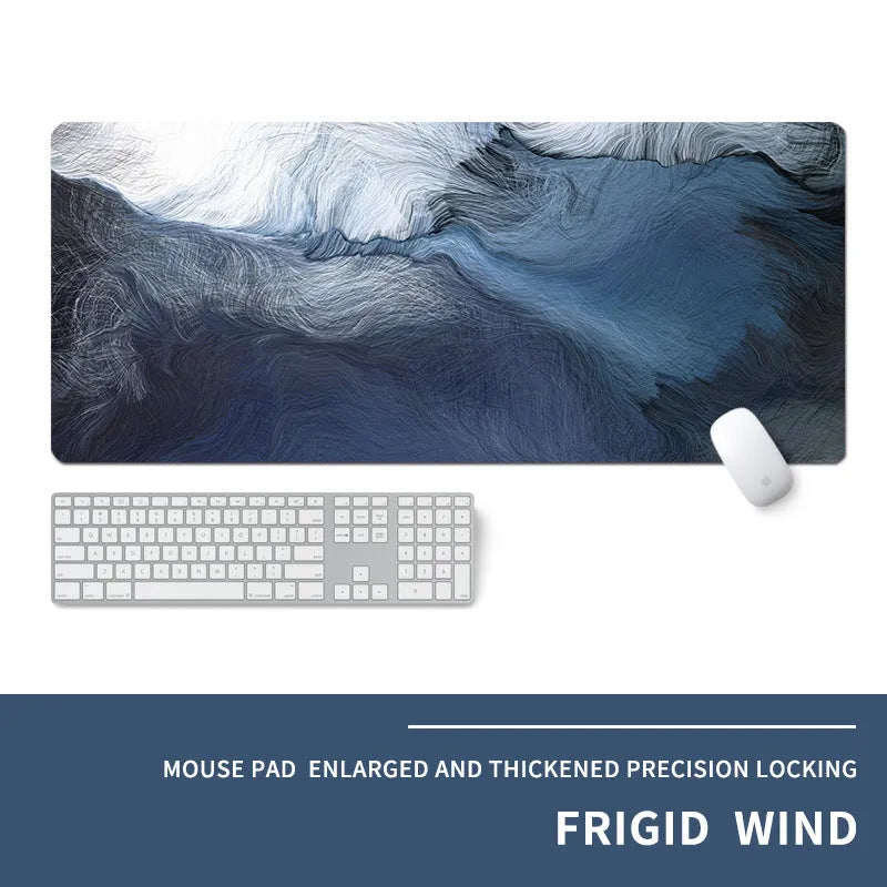 Oversized thick gaming mouse pad with printed e-sports design on a desk with keyboard and mouse.
