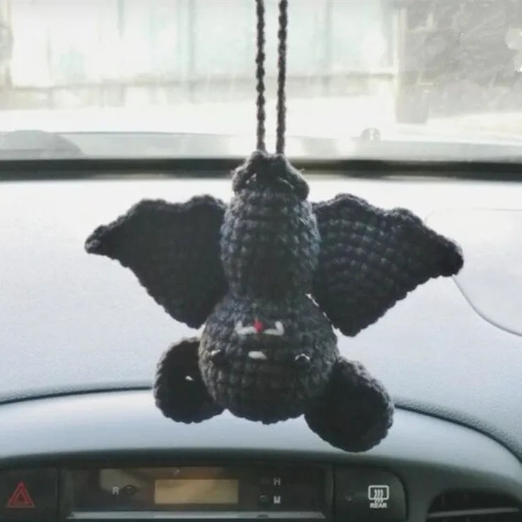 Plush hand-woven car hanging ornament in a cartoon design made from polyester
