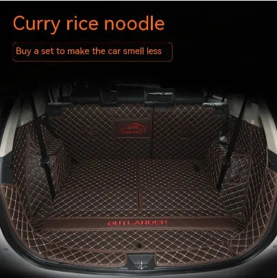 Mitsubishi Outlander custom boot liner with 3D raised edges and non-slip surface in a vehicle boot.