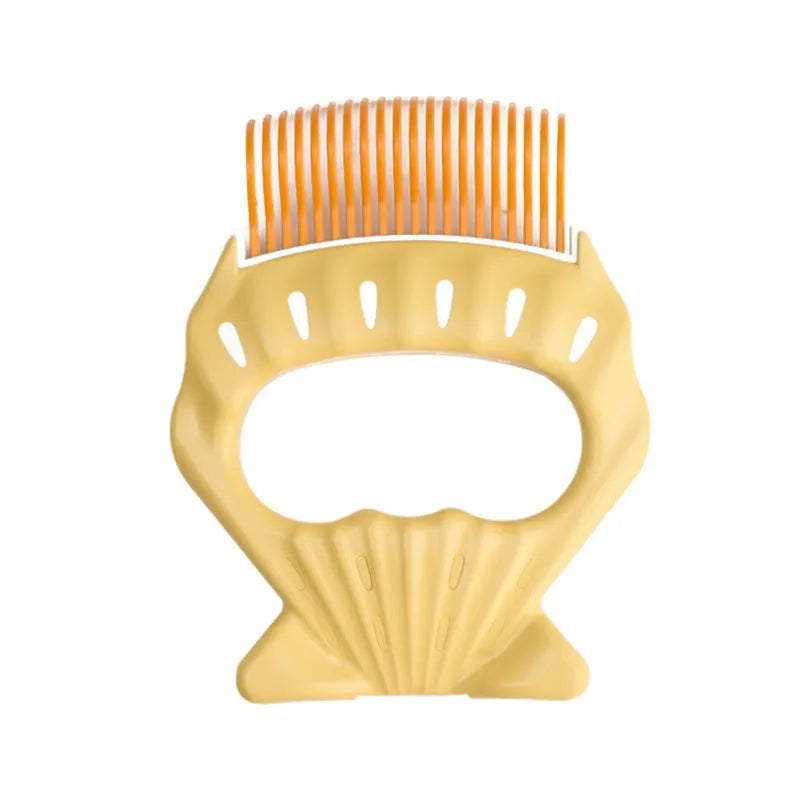 Green shell shaped plastic pet grooming comb with fine bent wire bristles on a white background.