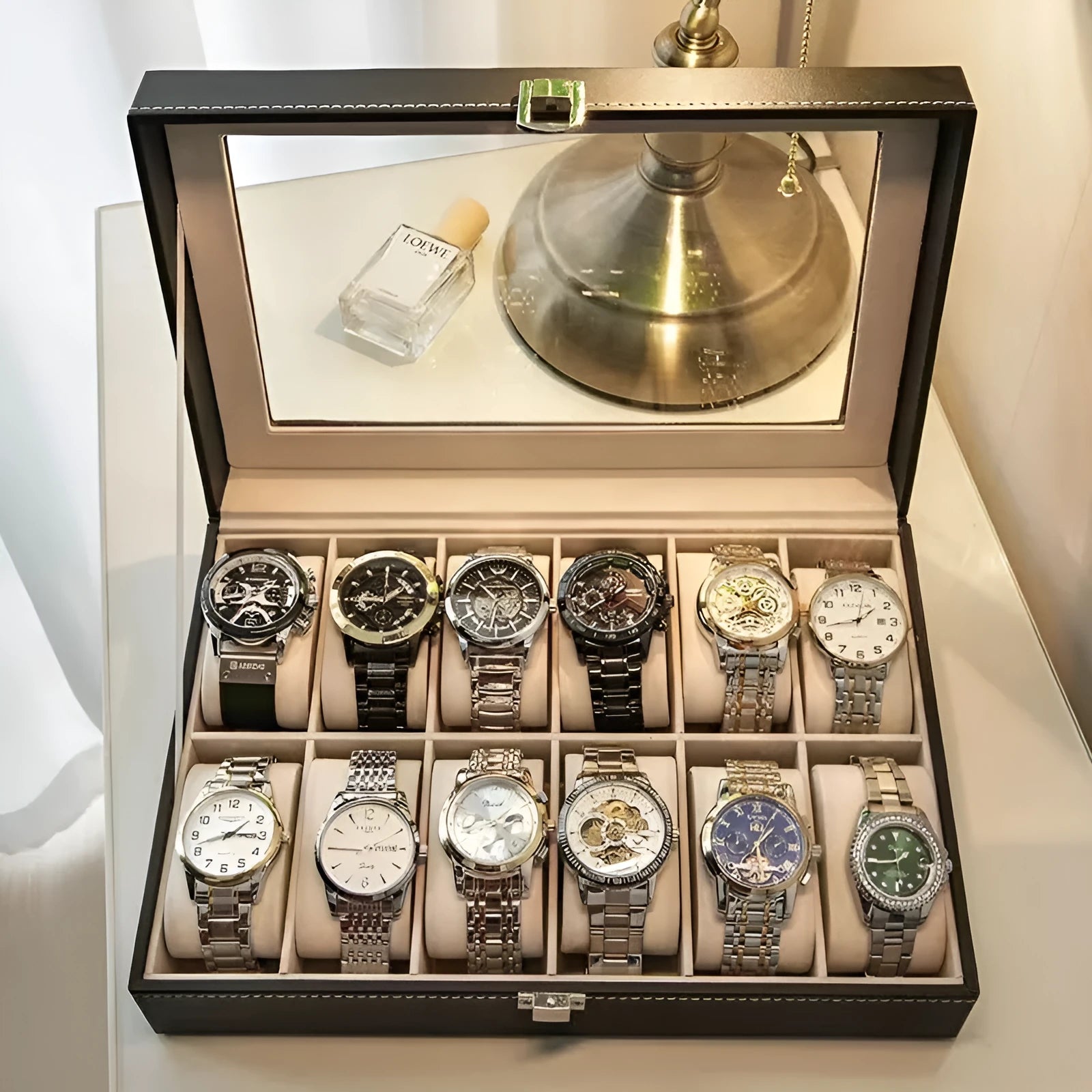 Grey high-grade leather watch storage box with see-through lid for dust protection.