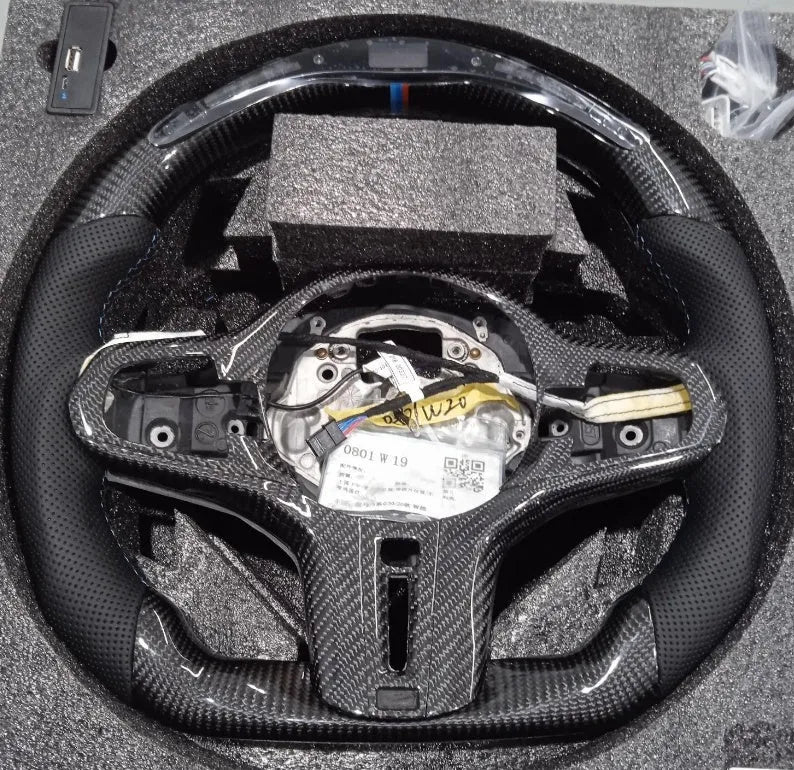 Black carbon fibre LED steering wheel for BMW X3 and X5 models with intelligent display