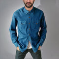 A man or woman wearing a regular-fit denim cardigan coat in khaki, showcasing button-front style.