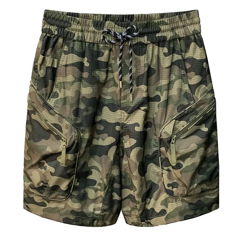 Man wearing loose fit camouflage cargo shorts made from quick-drying cotton blend fabric.