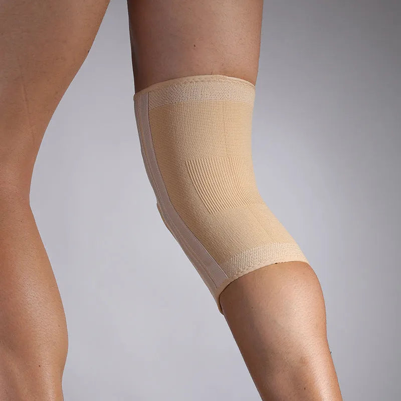 Nylon thick knee pad in skin colour on white background with M L XL size labels
