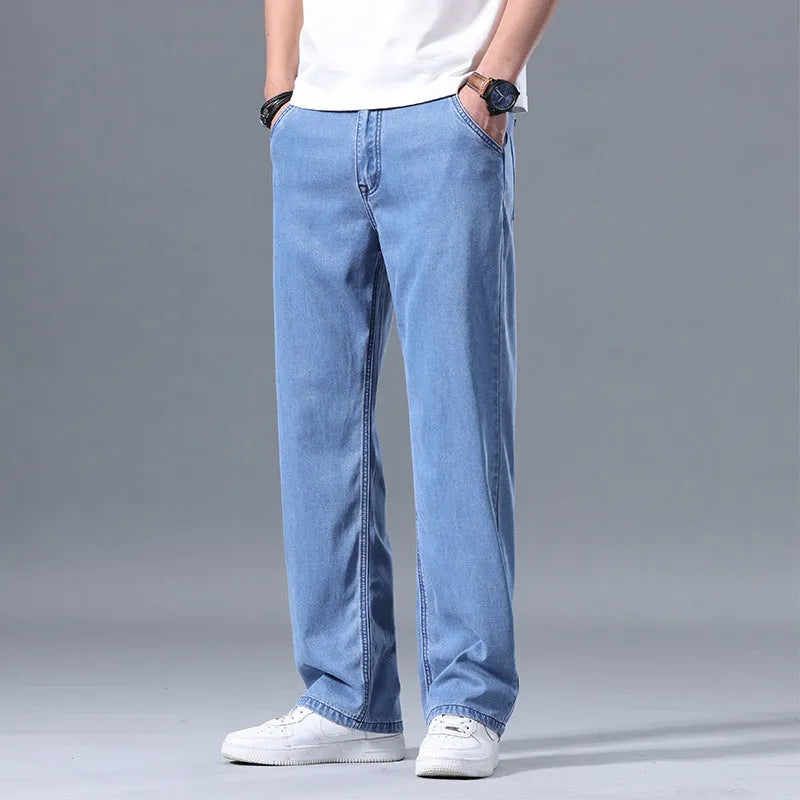 Men's straight leg loose fit lyocell jeans in blue and grey shades with zipper fly