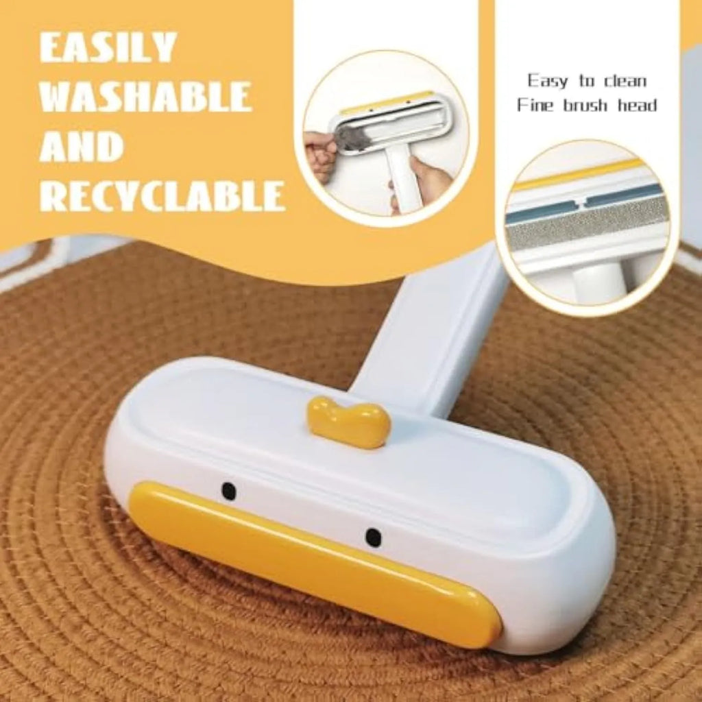 Portable yellow duck pet hair remover tool with polyester bristles for furniture and car seats.