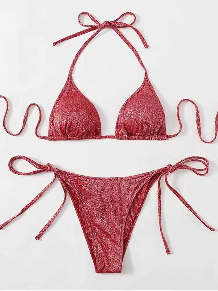 Women's bandage style bikini swimsuit in multiple colours on a size chart.