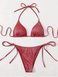 Women's bandage style bikini swimsuit in multiple colours on a size chart.
