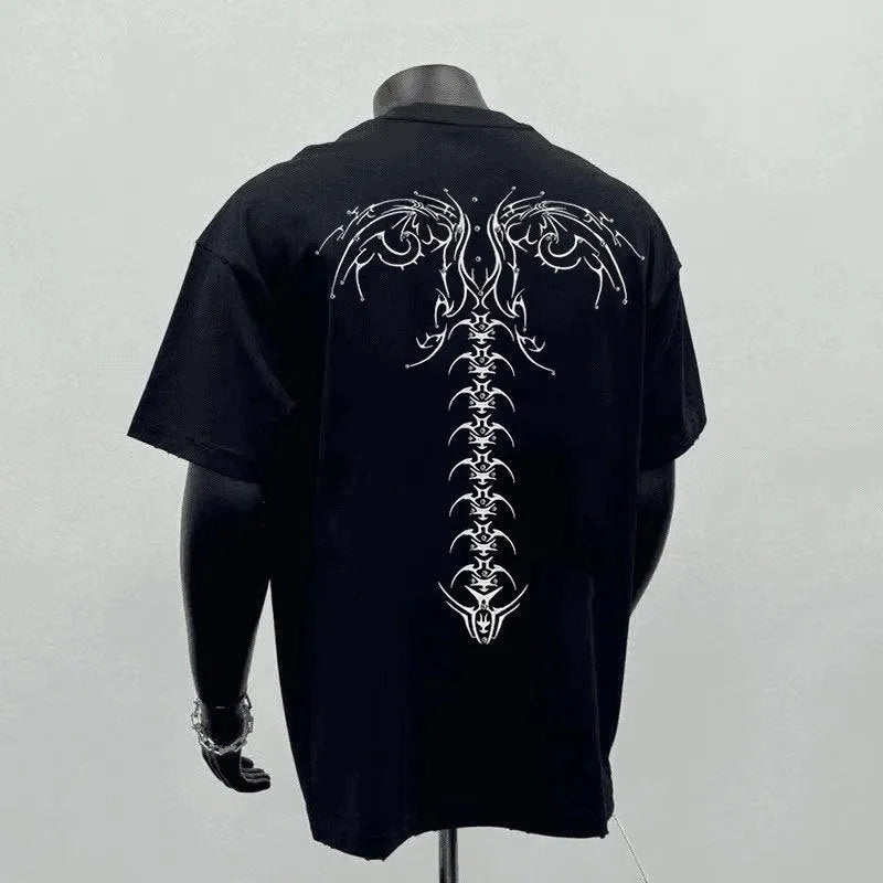 Men's black loose fit pure cotton short sleeve t-shirt with a print, laid flat.