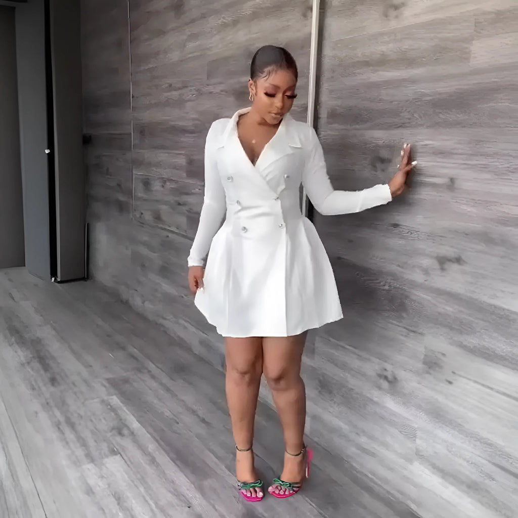 White lapel long sleeve pencil suit dress with button detail on display