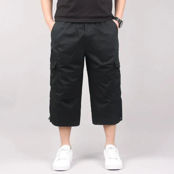 Men's loose-fit cotton cropped casual pants in army green colour on a white background