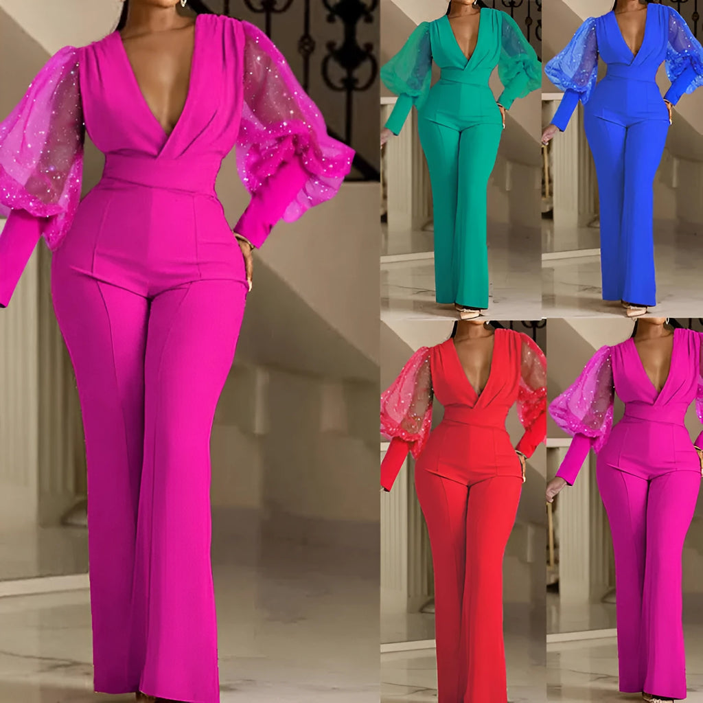 Red long sleeve women's jumpsuit with slim bodice, wide legs, and elasticated waist.