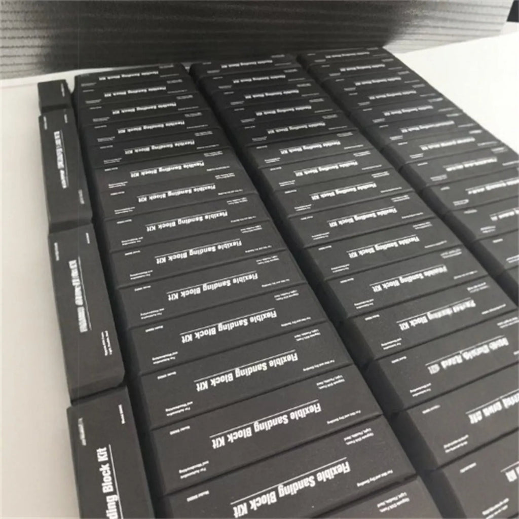 Set of seven black EVA frosted blocks for metal polishing and surface texturing.