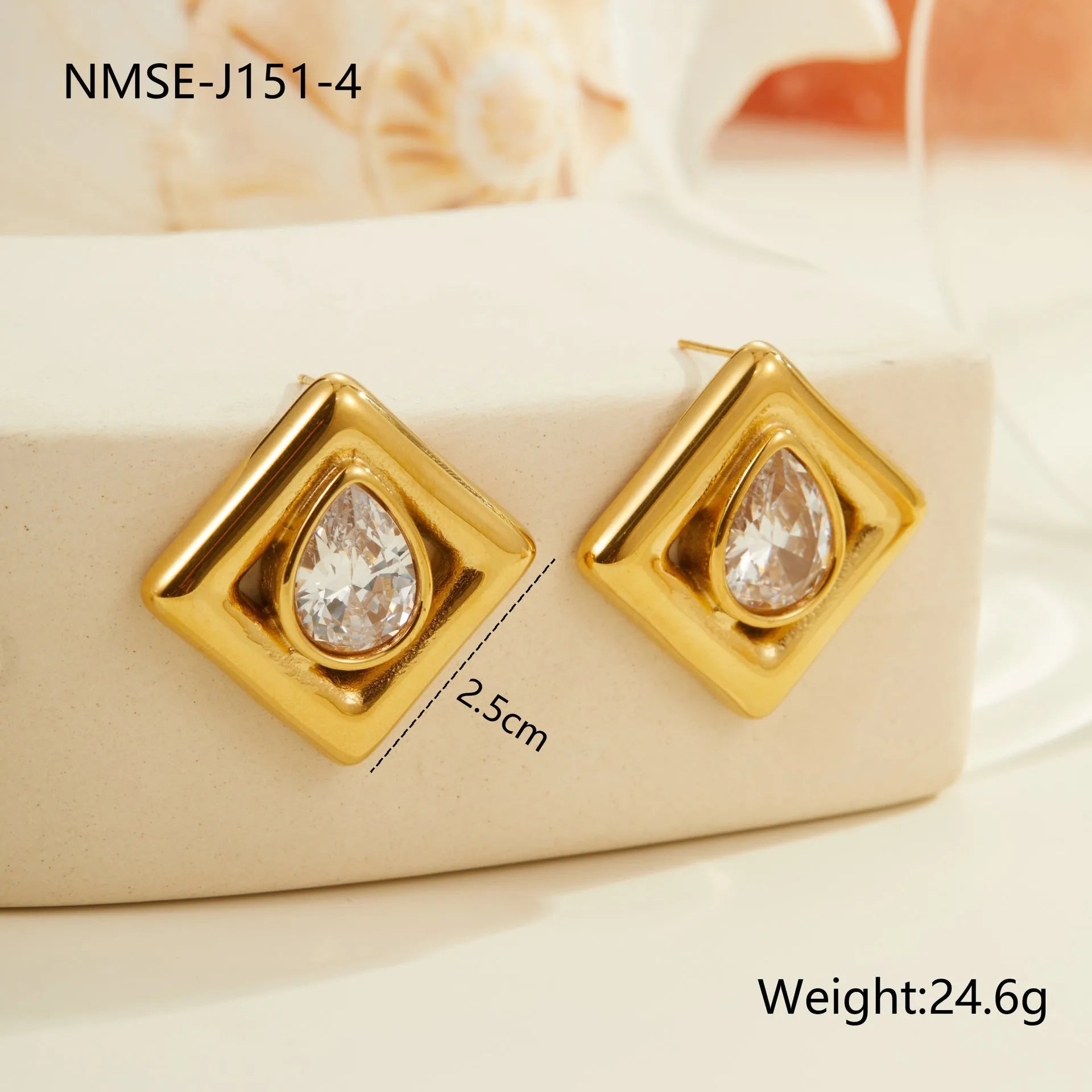 Gold geometric water drop zircon stud earrings with butterfly back fastenings