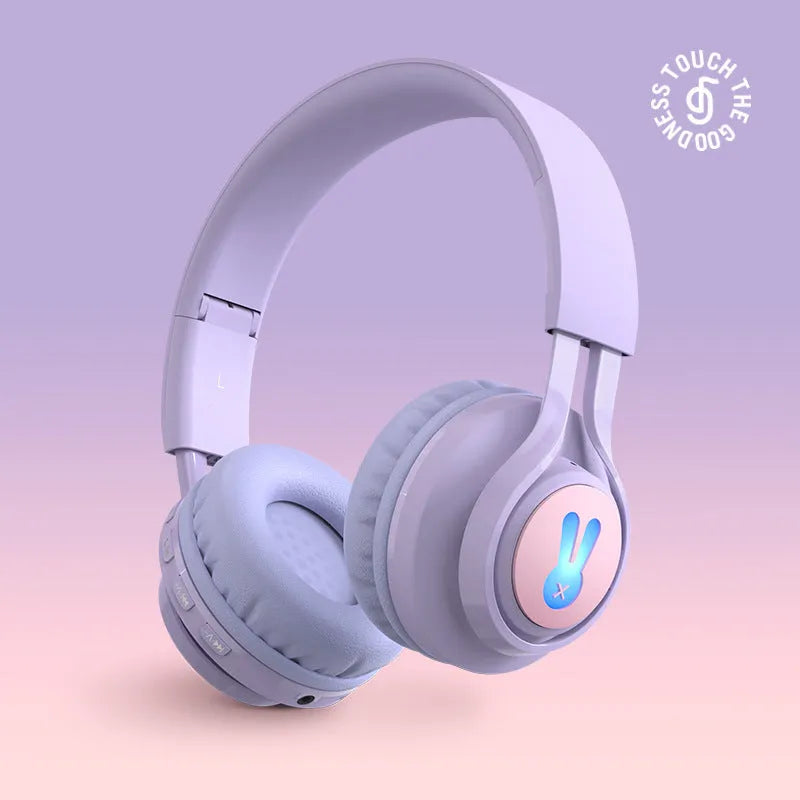 Wireless children's headphones with RGB LED lights in bunny pink colour with stereo sound and microphone