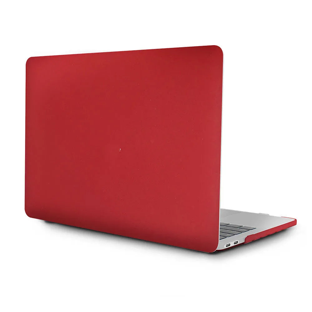 Frosted transparent black plastic protective case fitted on a MacBook Pro showing matte finish