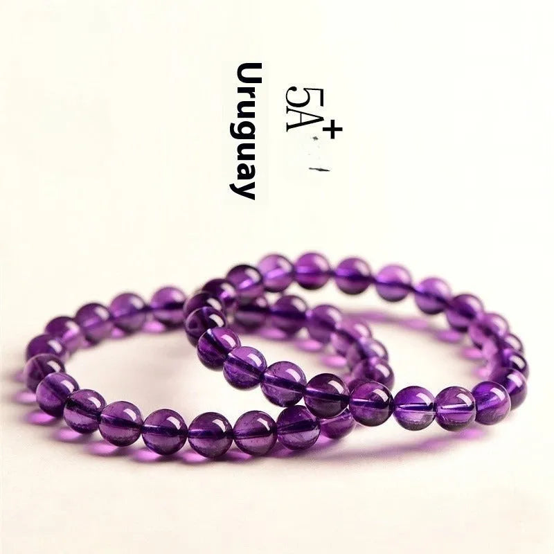 Natural amethyst bracelet with scattered Uruguay beads in selectable sizes and colour grades.