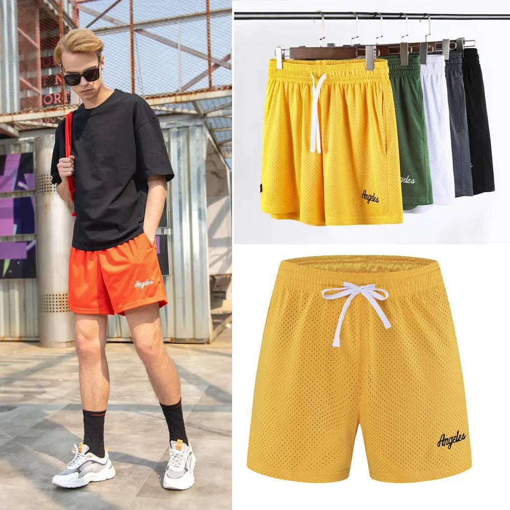 Men's black double-layer mesh shorts for summer sports and leisure wear.