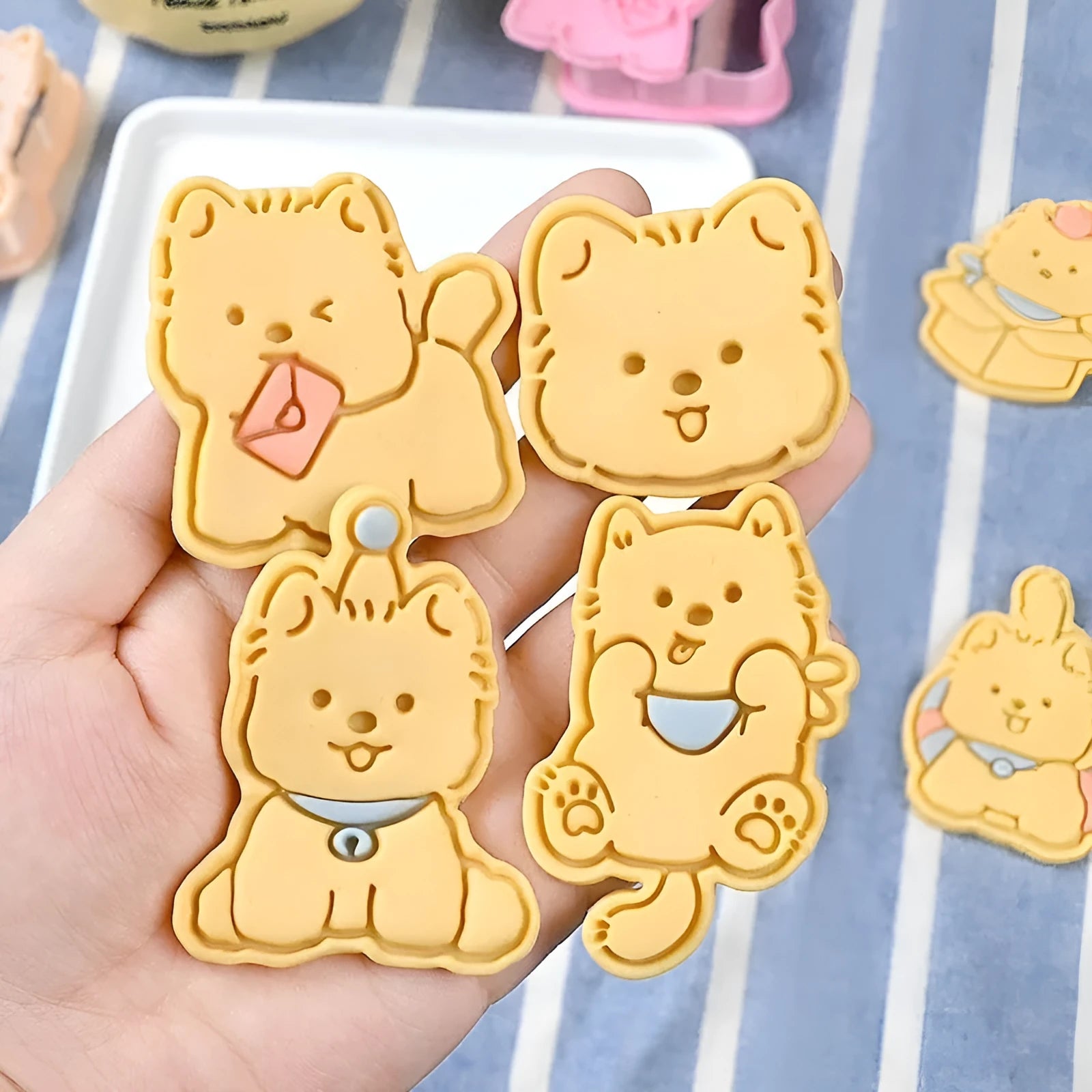 Plastic cartoon dog biscuit mould set with multiple puppy-themed designs