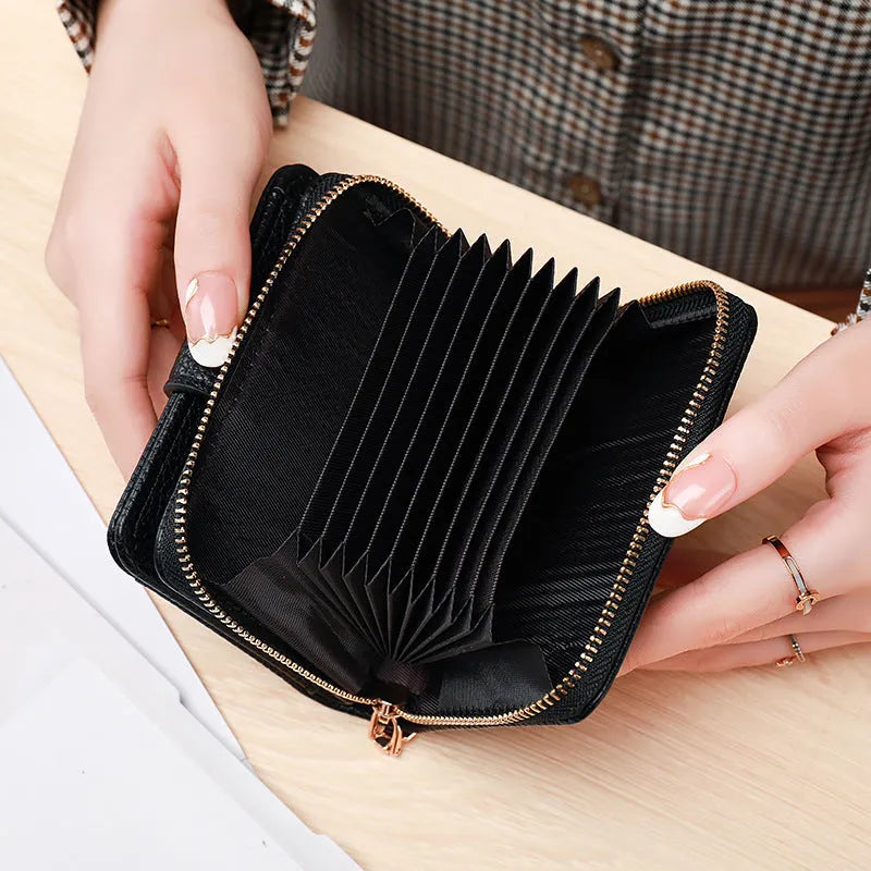 Ladies' short wallet with lychee pattern in beige, showing 2-fold design and card slots