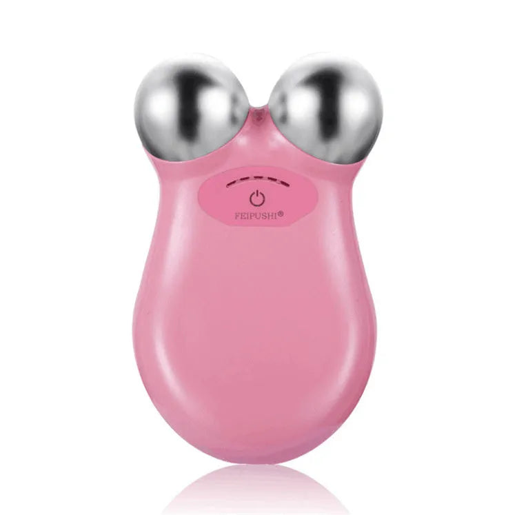 Pink or white HS-858 micro current facial lifting and firming device measuring 106mm by 65mm.