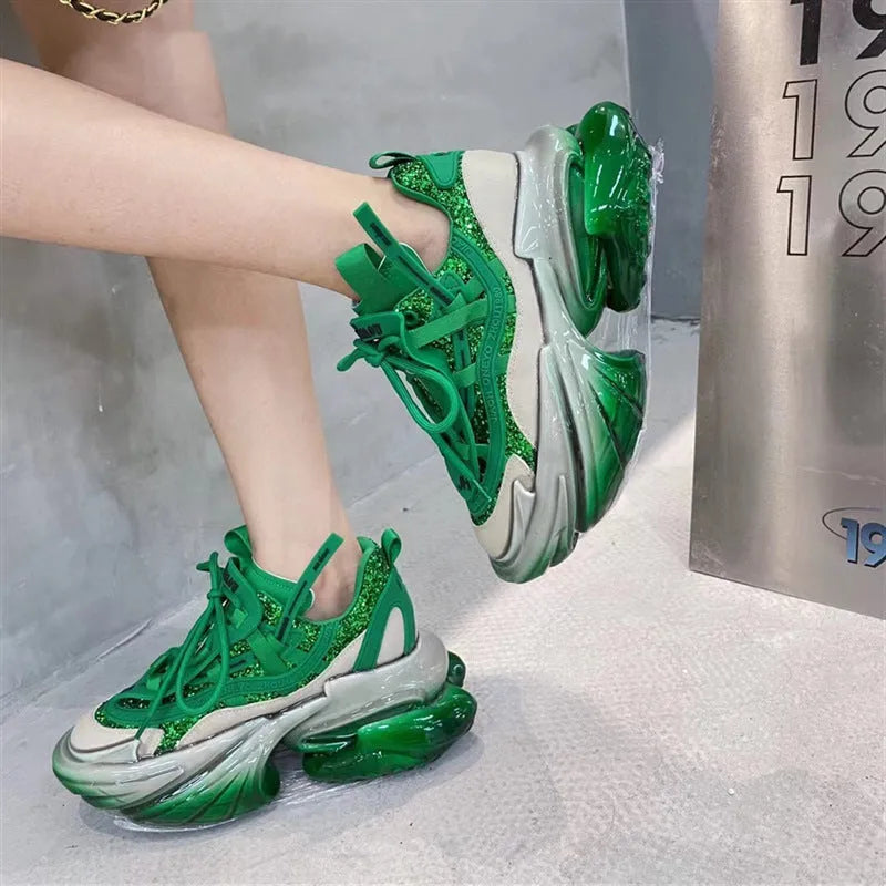Women's leather casual sports shoes with thick jelly sole and cross-tie design in assorted colours.