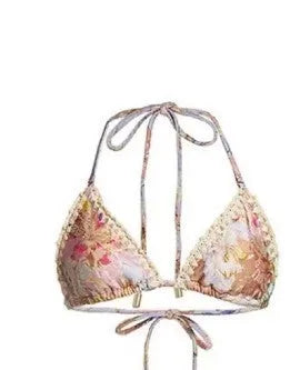 Women's creamy-white floral bikini set with matching skirt for beach and swimming