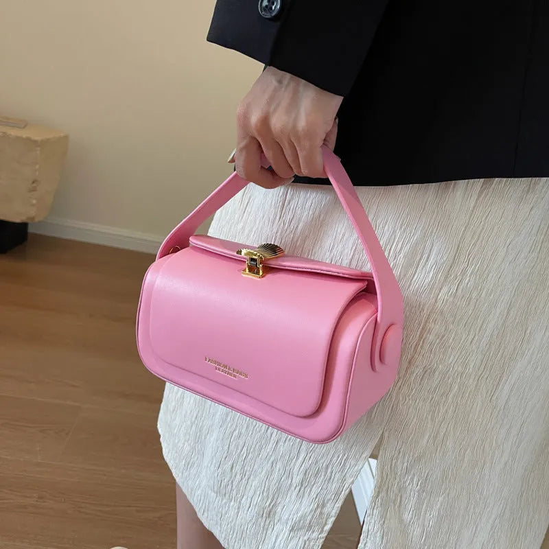 Women's personalised PU leather shoulder messenger bag in beige with letter detailing and stitching.