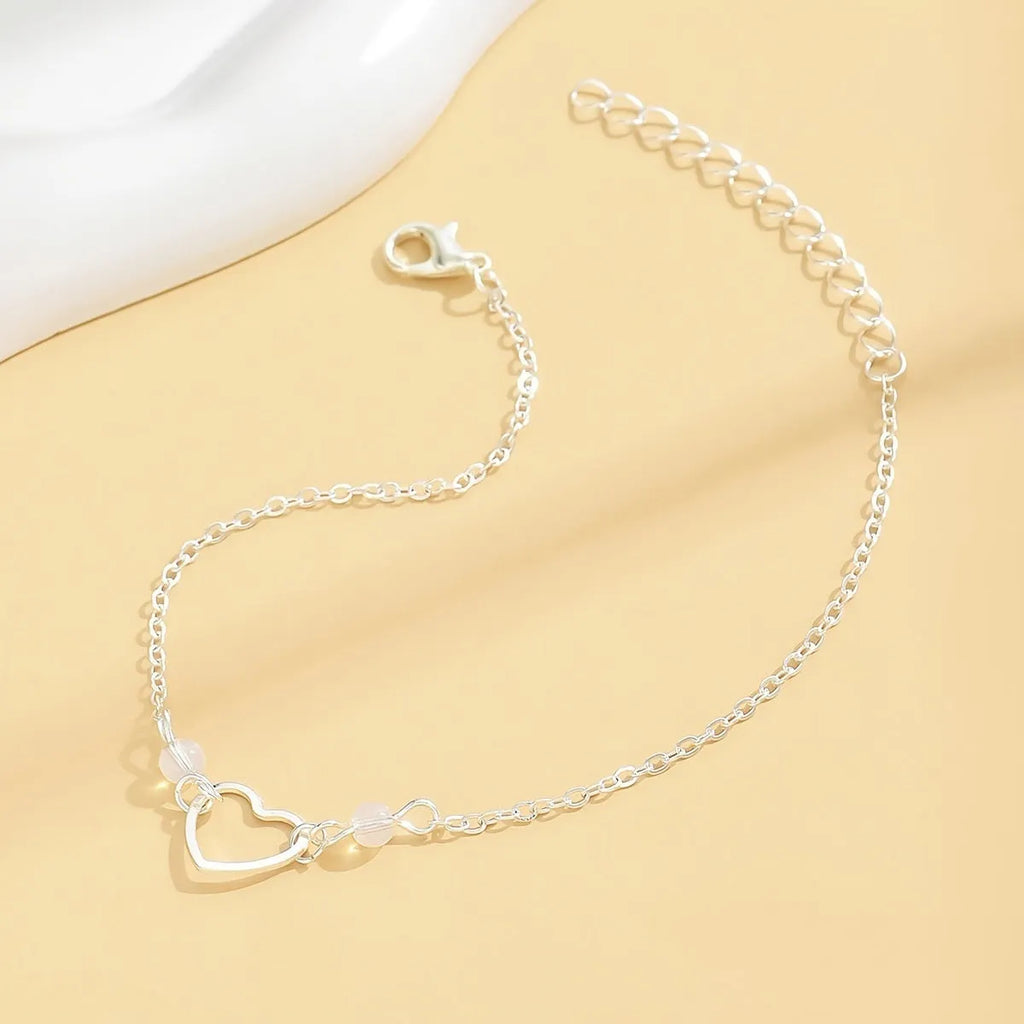 Adjustable heart pendant anklet in gold or silver with geometric design