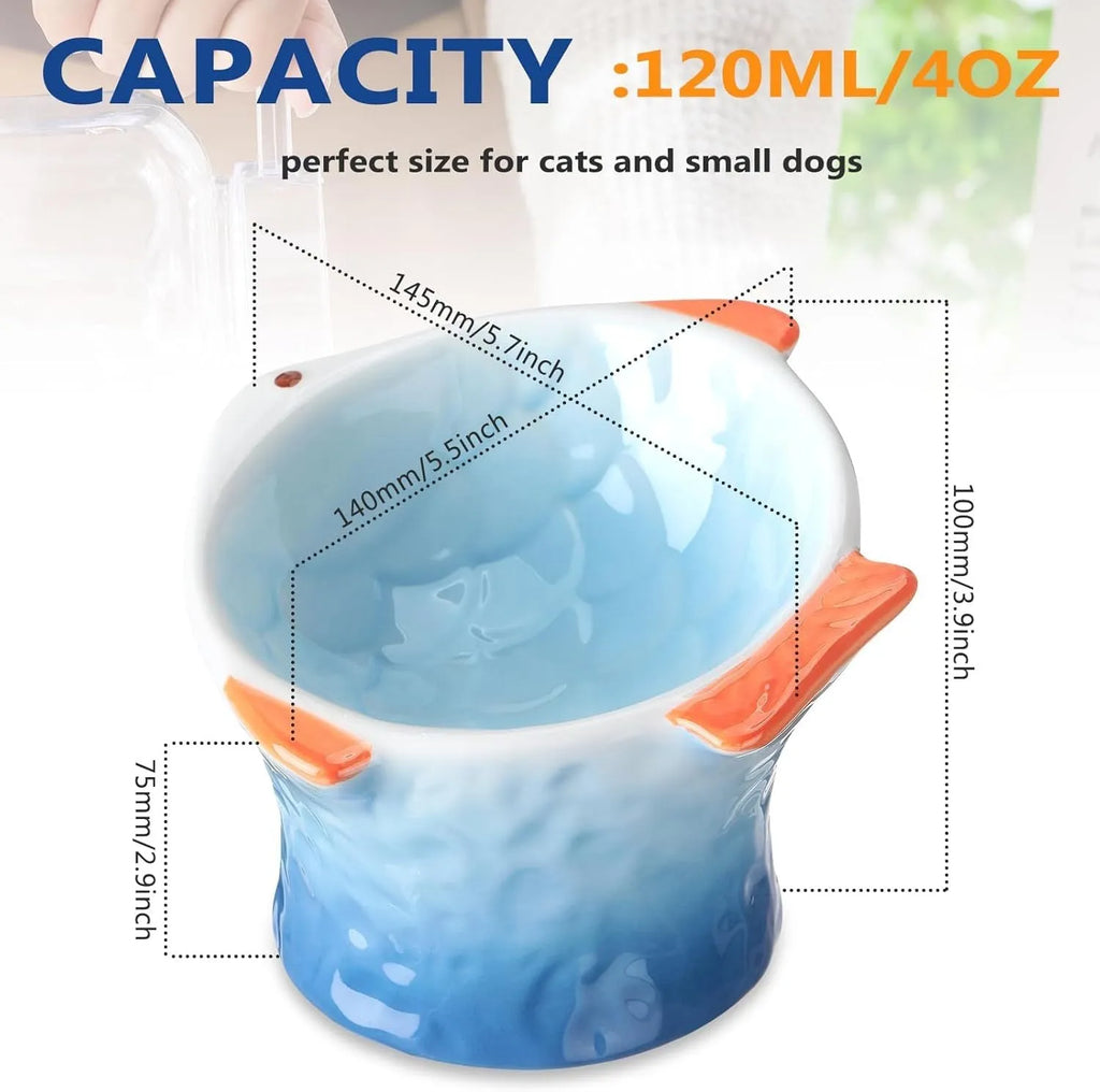 Set of blue ceramic cat feeder bowls in a fish shape with a 15-degree tilt angle.