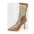 Gold women's high heel sandals with pointed stiletto toe and mesh upper.