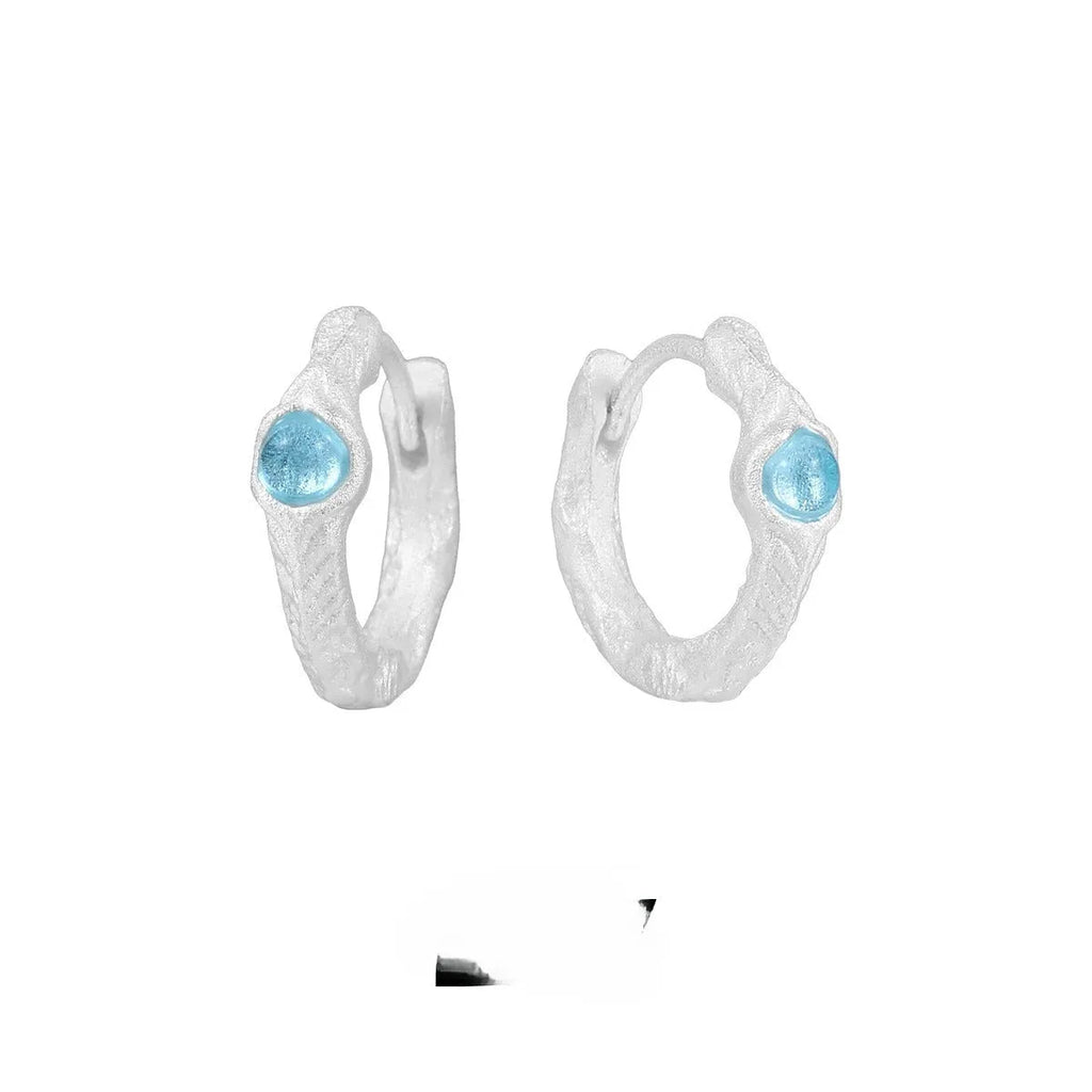 925 sterling silver geometric ear clip with burnt silver electroplated finish and round elements