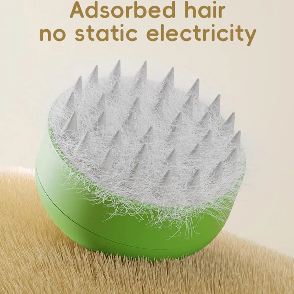 Green and yellow rechargeable steam brush for grooming cats and dogs on a table.
