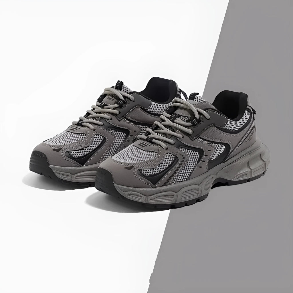 Low-top Dad style casual sneaker with round toe, leather stitching, and front lace-up closure on EVA platform sole